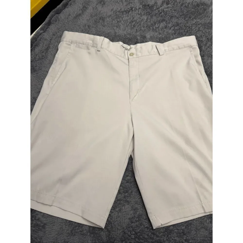 Nike Golf Tour Performance Khaki Shorts, Size Men’s 38. Color is beige.